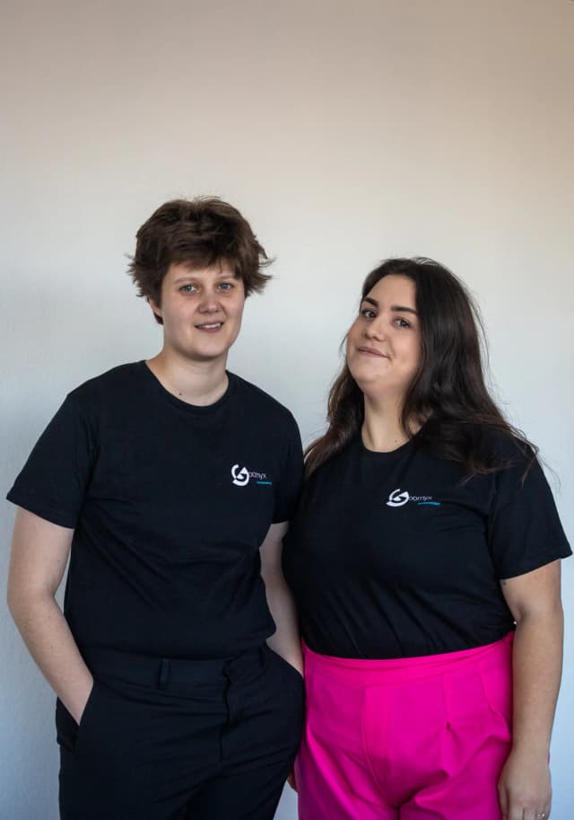 Alex and Shannon with a Goomyx t-shirt on.